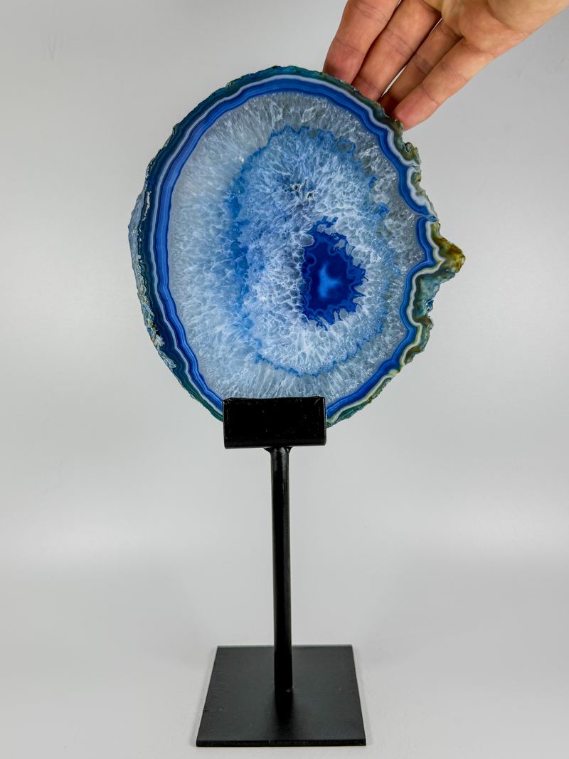 Blauwe agaatschijf met heldere rand